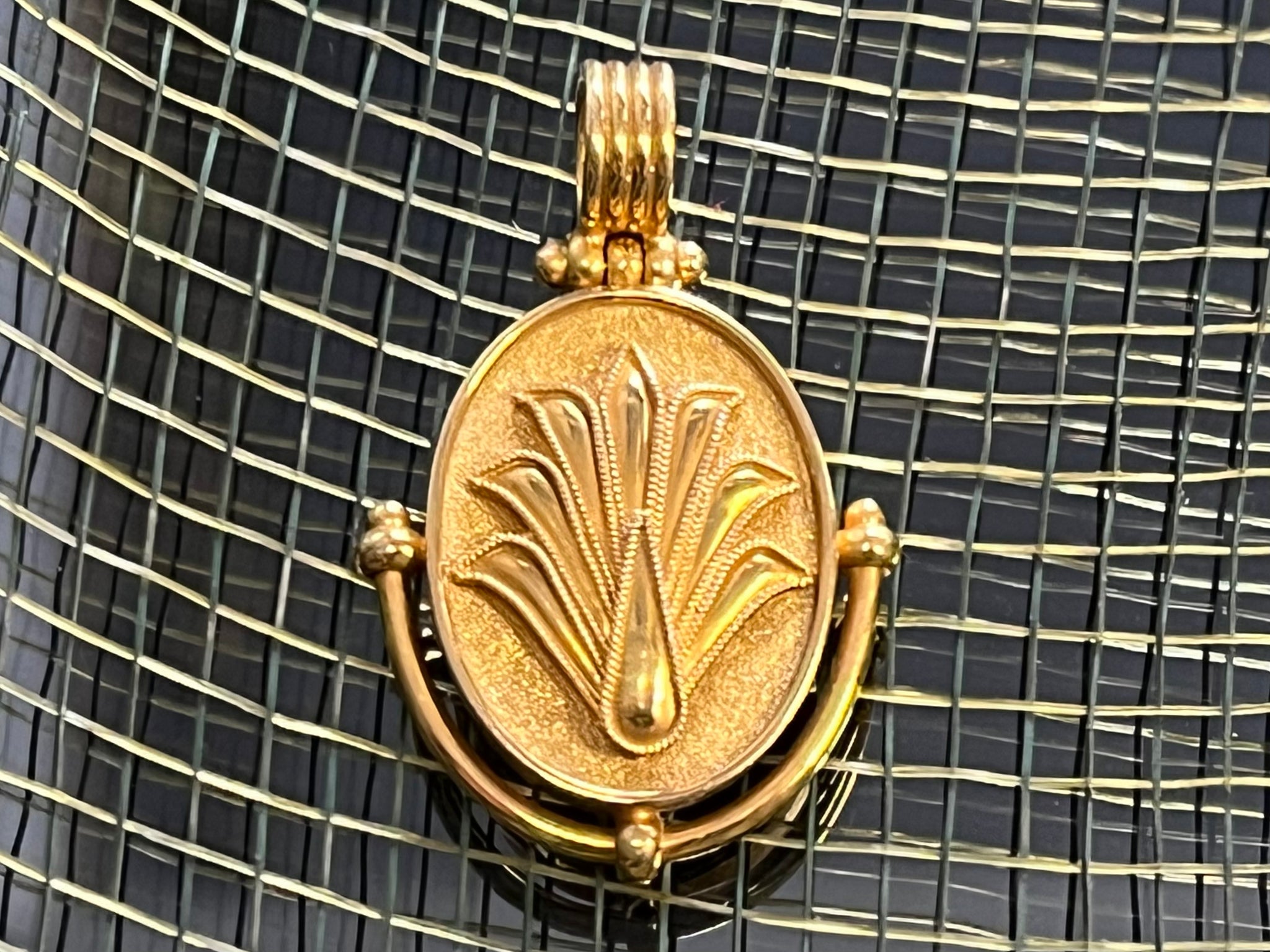 18k gold Medallion